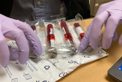 Vials of blood from a participant in a clinical study of the effectiveness of a new liquid biopsy technology are packaged for shipment at Oregon Health & Science University in Portland, Ore., on March 14, 2022. The clinical trial will follow hundreds of participants for three years to see if signals of any cancers that participants later develop were present in their blood.