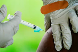 In this Sept. 14, 2021, file photo, a health worker administers a dose of a Pfizer COVID-19 vaccine during a vaccination clinic in Reading, Pa. Pfizer, Thursday, April 14, 2022, wants to expand its COVID-19 booster shots to healthy 5- to 11-year-olds. U.S. health authorities already urge everyone 12 and older to get one booster dose for the best protection. And those 50 and older have the option of a second booster.
