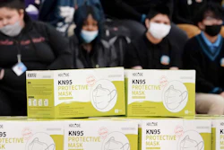 Boxes of KN95 protective masks are stacked together before being distributed to students at Camden High School in Camden, N.J., Wednesday, Feb. 9, 2022. According to a study by the Centers for Disease Control and Prevention released Tuesday, April 26, 2022, three out of every four U.S. children have been infected with COVID-19.