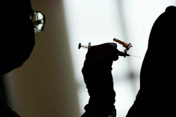 A nursing student administers a Moderna COVID-19 vaccine at a vaccination center at UNLV, in Las Vegas on April 26, 2021. The Food and Drug Administration on Friday, April 29, 2022, set tentative dates in June to publicly review COVID-19 vaccines for the youngest American children, typically the final step before authorizing the shots.