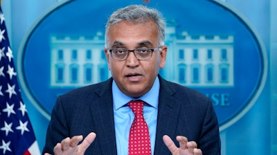 White House COVID-19 Response Coordinator Dr. Ashish Jha speaks during the daily briefing at the White House in Washington, April 26, 2022. Speaking to the Associated Press, Jha said Americans' immune protection from the virus is waning and the virus is adapting to be more contagious, and that booster doses for most people will be necessary — with the potential for enhanced protection from a new generation of shots.