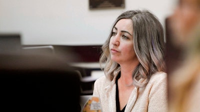 RaDonda Vaught, a former Vanderbilt University Medical Center nurse charged with in the death of a patient, listens to the opening statements during her trial at Justice A.A. Birch Building in Nashville, Tenn., Tuesday, March 22, 2022. Nurses planned to protest on Friday, May 13, morning outside the courtroom where Vaught was scheduled to be sentenced for the death of a patient. Vaught was found guilty in March of criminally negligent homicide and gross neglect of an impaired adult after she accidentally administered the wrong medication. She faces up to eight years in prison.