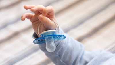 Using a common, commercially available pacifier, the researchers created a system that samples a baby’s saliva through microfluidic channels.