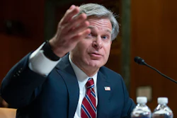 FBI director Christopher Wray testifies during a Senate Appropriations Subcommittee hearing in Washington, on May 25, 2022. Wray says his agents thwarted a planned cyberattack on a Boston children's hospital that was to have been carried out by hackers sponsored by the Iranian government.