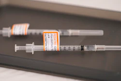Prepared Pfizer COVID-19 vaccine syringes for children ages 5 to 11 and adults are displayed on a table at Northwest Community Church in Chicago, Dec. 11, 2021. The Biden administration said Thursday, June 2, 2022, that children under 5 may be able to get their first COVID-19 vaccination doses as soon as June 21, if federal regulators authorize shots for the age group, as expected.