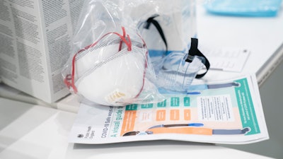 In this Thursday, April 16, 2020 photo, a view of masks and goggles, part of PPE, personal protective equipment, to avoid being infected or transmitting coronavirus, at the Nightingale Hospital North West set up in the Manchester Central Convention Complex in Manchester, northern England. The British government plans to burn billions of pounds (dollars) in unusable protective equipment purchased at haste during the coronavirus pandemic to generate power, a public spending watchdog said Friday, June 10, 2022.