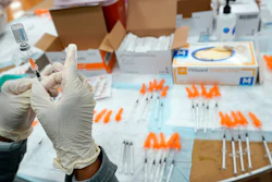 A Northwell Health registered nurse fills a syringe with a COVID-19 vaccine at a pop up vaccination site the Albanian Islamic Cultural Center, April 8, 2021, in the Staten Island borough of New York. The Food and Drug Administration on Thursday, June 30, 2022 recommended that COVID-19 booster shots be modified to better match more recent variants of the coronavirus.