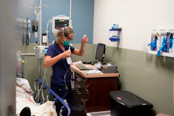 Registered nurse Sandra Younan sets up a new intravenous line for a patient under her care at Providence Cedars-Sinai Tarzana Medical Center in Los Angeles on March 11, 2021. California officials, on Tuesday, July 19, 2022, announced health insurance rates would increase an average of 6% for the 1.7 million people who purchase coverage through the state run health insurance marketplace, Covered California. Health insurers in individual marketplaces across 13 states and Washington D.C. will raise rates an average of 10% next year.