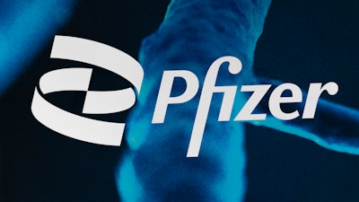 The Pfizer logo is displayed at the company's headquarters, Feb. 5, 2021, in New York. Sales of Pfizer’s COVID-19 vaccine and treatment in the second quarter propelled the pharmaceutical giant to the largest quarterly sales in its history, Thursday, July 28, 2022.