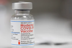 A vial of the Moderna COVID-19 vaccine is displayed on a counter at a pharmacy in Portland, Ore. on Dec. 27, 2021. The Biden administration said Friday it has reached an agreement to buy 66 million doses of Moderna’s next generation of COVID-19 vaccine that specifically targets the highly transmissible omicron variant, ensuring enough supply this winter for everyone who wants the upgraded booster.