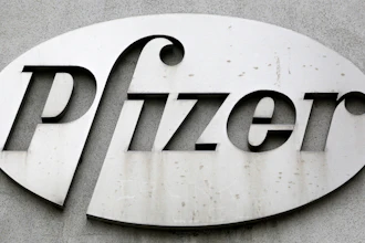The Pfizer logo is displayed on the exterior of a former Pfizer factory, on May 4, 2014, in the Brooklyn borough of New York. Pfizer is buying sickle cell drug maker Global Blood Therapeutics in an approximately $5.4 billion deal as it looks to accelerate growth after its revenue soared during the pandemic. Both companies' boards have approved the deal, which still needs regulatory approval and approval from GBT shareholders.