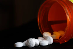 An arrangement of Oxycodone pills sit next to a bottle in New York on Aug. 29, 2018.