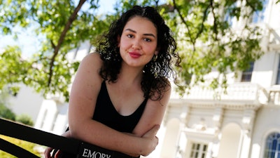 Helen Khuri poses for a portrait on the campus of Emory University Thursday, Oct. 6, 2022, in Atlanta. Khuri’s mother found a specialist to help her when the 19-year-old’s post-traumatic stress disorder flared up last spring.