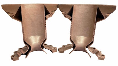 A cross-sectioned thrust chamber printed on a Velo3D Sapphire system in GRCop-42. The chamber walls contain internal channels for regenerative cooling.
