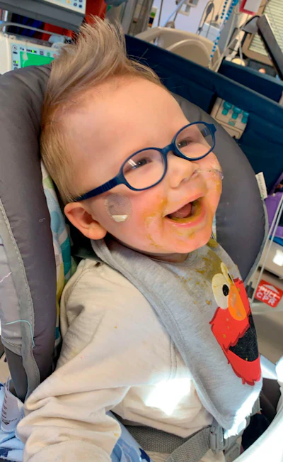 This photo provided by Reeanne Parisien shows her son, Greyson, smiling while at the Mayo Clinic in Rochester, Minn., in March 2019. Greyson's journey to correct a heart defect led the Turtle Mountain Band of Chippewa Indians to designate a spot on tribal IDs for organ donation.