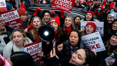 Nurses stage a strike in front of Mt. Sinai Hospital in the Manhattan borough of New York Monday, Jan. 9, 2023, after negotiations broke down hours earlier.