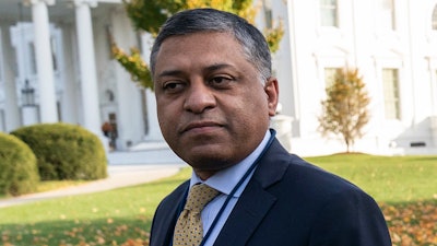Dr. Rahul Gupta, the director of the White House Office of National Drug Control Policy, walks at the White House on Nov. 18, 2021, in Washington.