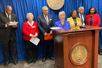 State Sen. Nan Orrock, D-Atlanta, flanked by supporters, announces federal complaints against Wellstar Health System, Wednesday, March 8, 2023, at the Georgia Capitol in Atlanta.