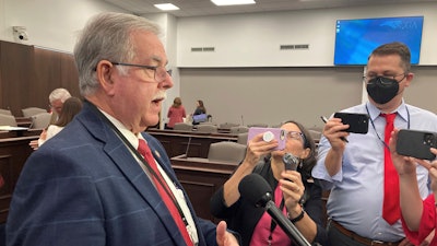 North Carolina state Rep. Donny Lambeth, R-Forsyth, speaks to reporters following the House Health Committee meeting at the Legislative Office Building in Raleigh, N.C., on Feb. 14, 2023.
