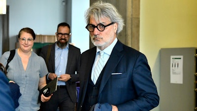 Italian surgeon Paolo Macchiarini arrives at the courtroom where his trial continues, at the Svea Court of Appeal, in Stockholm, Friday, April 21, 2023.
