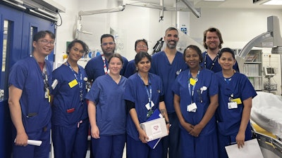 Dr Owais Dar (middle) and the study team in the Cardiac Catheterization Lab at Harefield Hospital and Acorai’s Chief Scientific Officer Matthew Mace (back right).