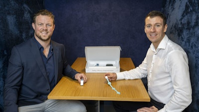 FeelTect Co-Founders, Dr Andrew Cameron, CEO (left), and Dr Darren Burke, CTO (right), displaying the Tight Alright wearable, pressure-sensing device for monitoring compression therapy.