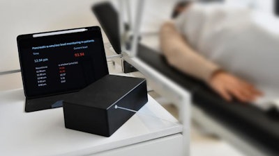 The Millifluidik device is positioned next to the patient's bed and enables real-time monitoring of amylase activity.