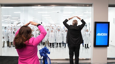 CEO Bob Bradway leads Amgen Ohio manufacturing staff in a cheer of “OH-IO.”