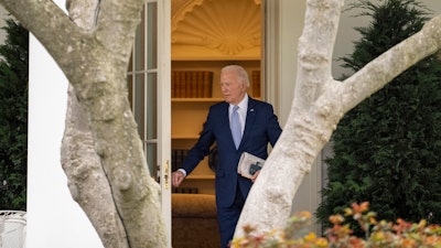 President Joe Biden walks out of the Oval Office to board Marine One on the South Lawn of the White House in Washington, Friday, March 22, 2024, to travel to Wilmington, Del.