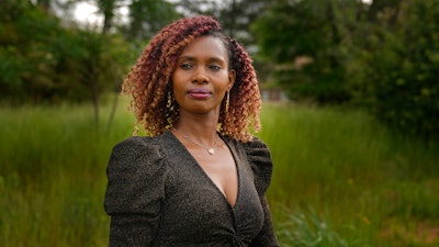 Culix Wibonele poses for a portrait on Monday, April 29, 2024, in Lawrenceville, Ga. Wibonele is a certified nursing assistant working in long-term care.