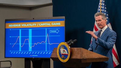 California Gov. Gavin Newsom speaks about the state's budget deficit in Sacramento, Calif., on Friday, May 10, 2024. Newsom has proposed to cancel a plan to increase how much the state pays doctors to treat patients on Medicaid. But voters could have the final word as a measure that qualified for the November ballot would force the state to pay doctors more for treating Medicaid patients.