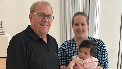 This photo provided by the family in 2024 shows Gary Baulos, left, with his daughter, Alison, and her daughter, Athena, at the Art Institute of Chicago. Alison Baulos says her 73-year-old father was about to head to a Kentucky hospital for open-heart surgery when it was abruptly canceled Friday morning, July 19, 2024. His was one of the many operations and medical treatments halted across the country Friday because of a global technology outage.