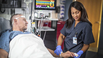 Doctor Monitoring Patient Health