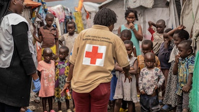Red Cross officials create awareness around mpox in the Don Bosco refugee camp in Goma, Democratic Republic of Congo, Thursday, Aug. 22, 2023.