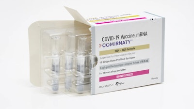 This photo provided by Pfizer in August 2024 shows a packaging for the company's updated COVID vaccine for ages 12 and up, approved by the U.S. Food and Drug Administration on Thursday, Aug. 22, 2024.