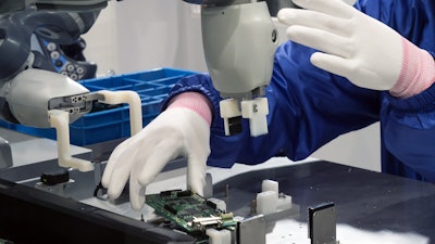 Cobots in electronic smart factory concept.