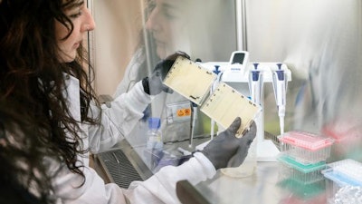 A team of scientists—including Kate Crawford, seen here—developed a technology that lets them edit the genomes of bacteria-fighting viruses, known as phages, in a streamlined and highly effective way.