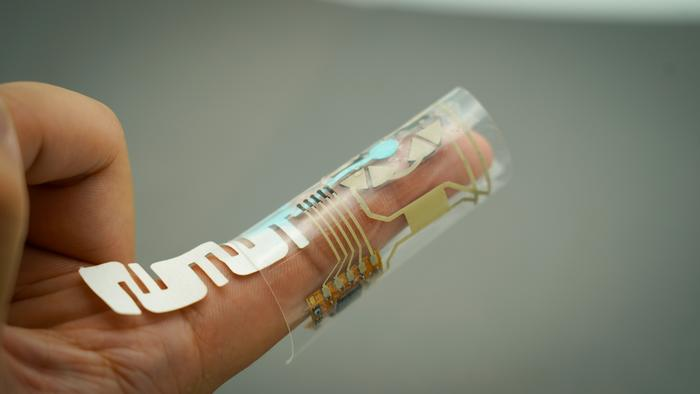 This finger wrap is powered by the wearer's fingertip sweat—and also monitors levels of glucose, lactate, vitamin C and levodopa in that same sweat.
