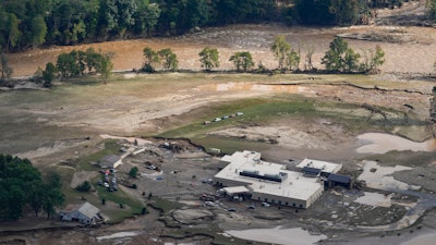 An aerial view of flood-damaged Unicoi County Hospital in the aftermath of Hurricane Helene, Saturday, Sept. 28, 2024, in Erwin, Tenn.