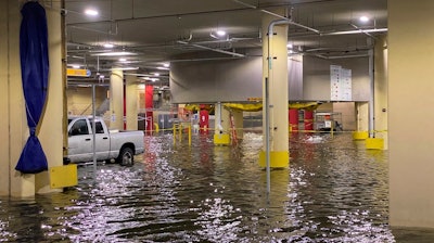 Flooding is seen at Tampa General Hospital as Tropical Storm Eta sends torrential downpours, storm surge flooding and wind across the Tampa Bay Area on Thursday, Nov. 12, 2020, in Tampa, Fla.