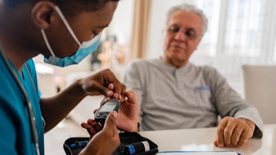 Health Worker Tests Older Person S Blood Sugar Diabetes