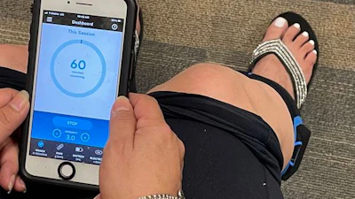 Transcutaneous Electrical Nerve Stimulation (TENS) device.