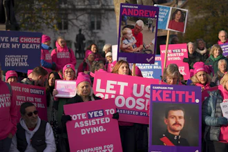 Pro legal assisted dying supporters demonstrate in front of Parliament in London, Friday, Nov. 29, 2024 as British lawmakers started a historic debate on a proposed to help terminally ill adults end their lives in England and Wales.