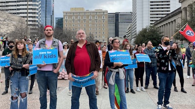 Advocates gather for a rally at the state Capitol complex in Nashville, Tenn., to oppose a series of bills that target the LGBTQ community, Feb. 14, 2023.