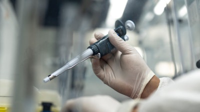 An employee works in Moldiag, a biotechnology startup, while producing mpox tests, in Tamesna, Morocco, Thursday, Nov. 28, 2024.