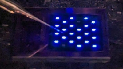 Integrated circuit at the core of the BIOSYNC implant will interface to the cell reservoirs electrically and optically.