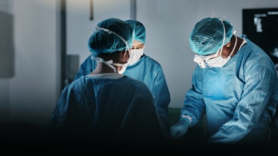 A medical team performing a surgical operation.