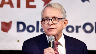 Ohio Gov. Mike DeWine introduces Ohio state senator and Republican candidate for U.S. Senate Matt Dolan during a campaign event in Columbus, Ohio, Monday, March 18, 2024.
