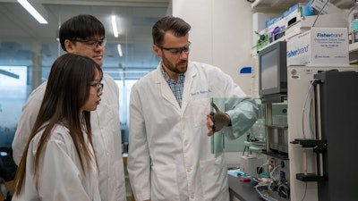 Through a series of experiments, the research team led by Scott Medina, right, William and Wendy Korb Early Career Professor of Biomedical Engineering at Penn State, replaced the water-based solution commonly used in protein-based medications with a perfluorocarbon oil and tested five different proteins with a range of health-related functions such as antibodies and enzymes.