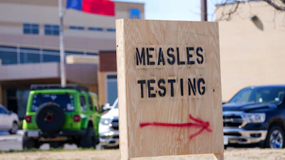 A sign is seen outside of Seminole Hospital District offering measles testing, Feb. 21, 2025, in Seminole, Texas.